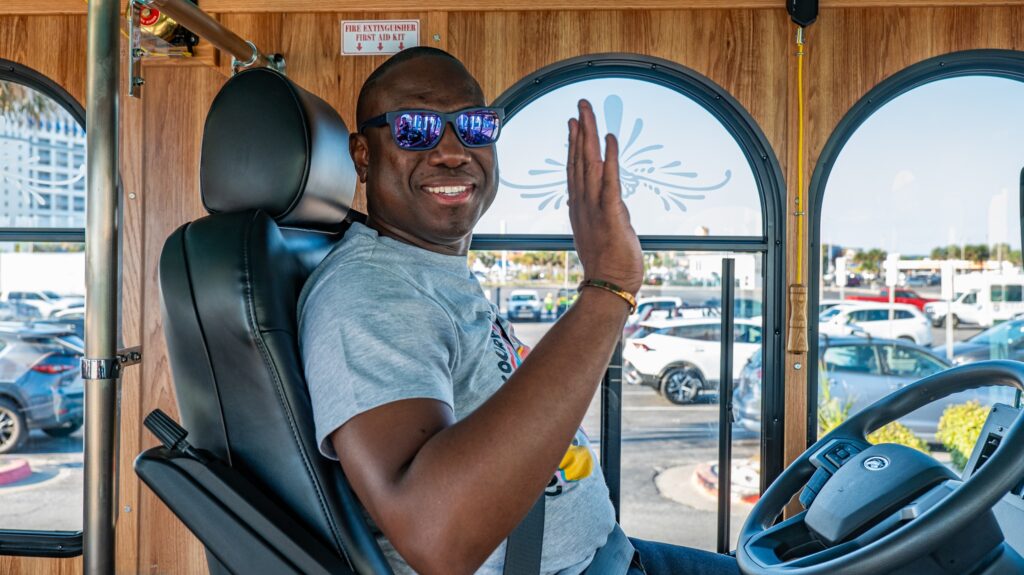 Man driving Pensacola Beach Island Trolley